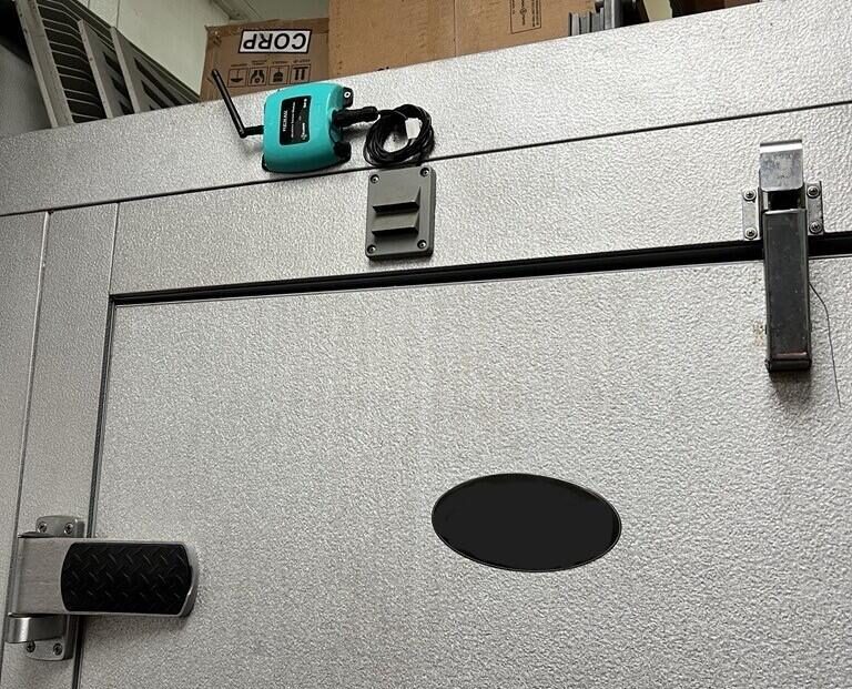 Renau Sensor Module mounted outside of a walk in cooler.